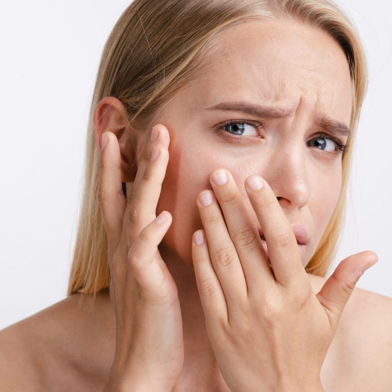 close-up-worried-woman-with-white-background